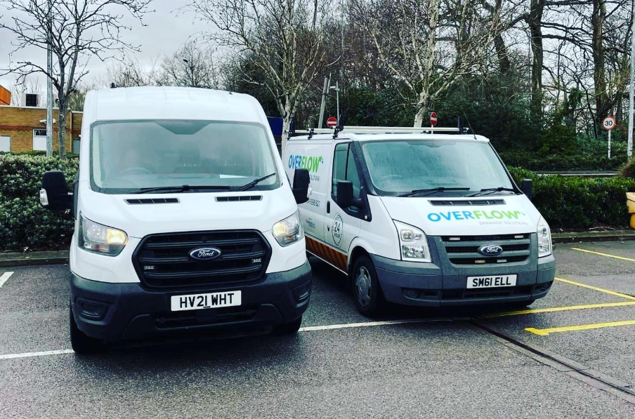 Overflow branded vans in the Bracknell yard prepped for the day's plumbing and drainage jobs
